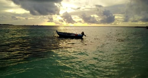 Natural birds eye travel shot of a white sand paradise beach and turquoise sea background in 4K