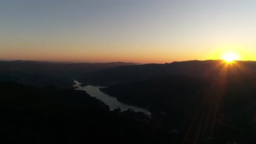 Sunset Sky Over Mountain Ridge in Highland