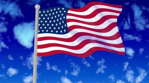 Waving American Flag on a Flagpole with Cloudy Blue Sky Background
