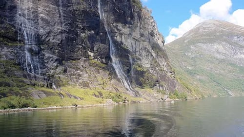 Seven sisters waterfall in the Geiranger fjord and the water surface