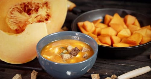 Bowl of Delicious Pumpkin Soup with Roasted Croutons