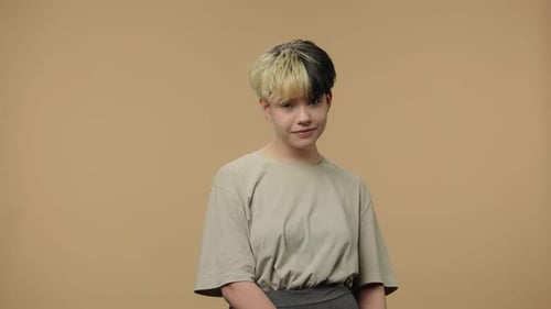Stylish Young Adult with Two-Tone Hair Posing