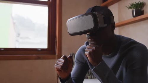 Person Uses VR Headset Experiencing Virtual Reality