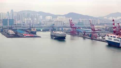 Timelapse Freighter Departs Incheon Port with Cranes