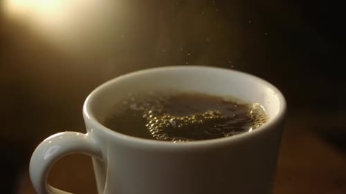 Steaming Coffee in a Mug Close Up