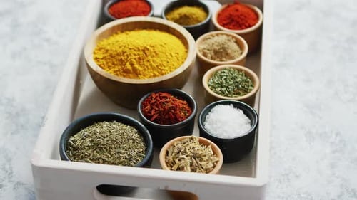 Variety of Spices in Wooden Tray