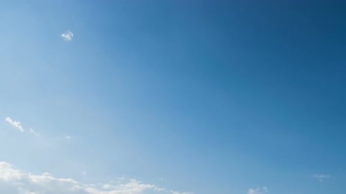 Timelapse of White Clouds in a Blue Sky
