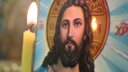 Kerze und Ikone von Jesus