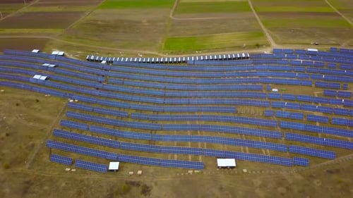 Solar Panels Farm (solar cell). Renewable green alternative energy concept - Aerial view