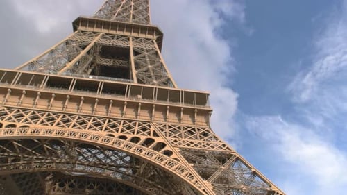 Eiffel Tower and Cloudy Sky