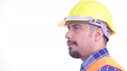 Closeup Profile View of Happy Bearded Persian Man Construction Worker Smiling