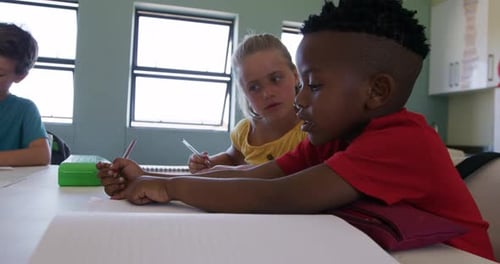 Group of kids studying in the class