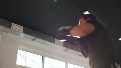 Man Fighting with His Shadow Facing Fears Boxing Training in Gym in Gloves Power Mma Fighter