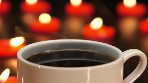 Coffee Cup with Red Heart Candles Background