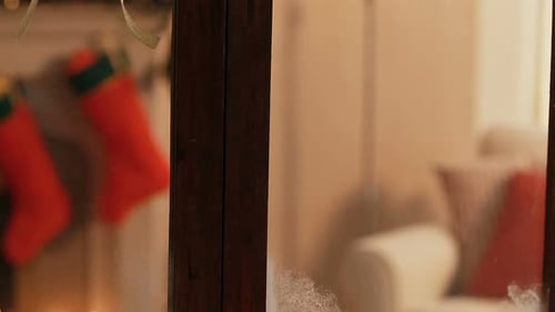 Festive Christmas Window with Snow and Candles