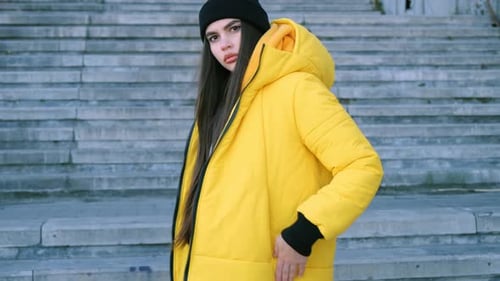 Stylish Woman in Yellow Jacket Posing Outdoors