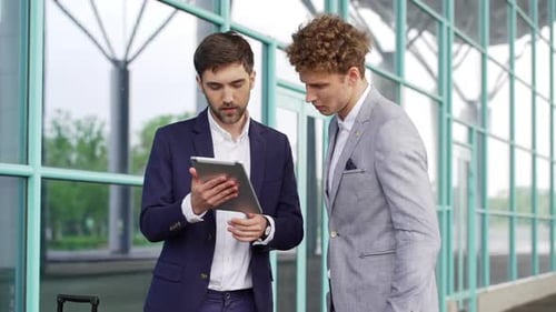 Two Businessmen Discussing Partnership