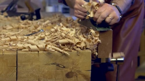Joiner Planes Solid Wood in his Workshop