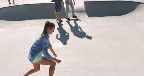 Young Adults Skateboarding at the Skate Park