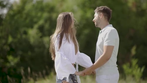 Romantic Happy Couple Having Fun And Dancing Outdoors In Nature.