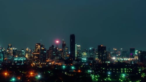 Time Lapse Night Cityscape and Highrise Buildings in Metropolis City Center