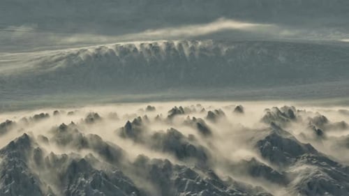 Snow Drifts Across Mountain Peaks