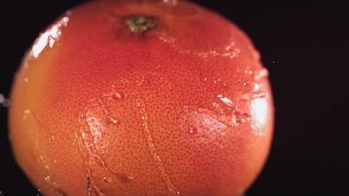 Close Up Red Grapefruit Washed With Water