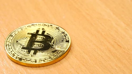 Bit Coin On Table. Gold Bitcoin Btc.