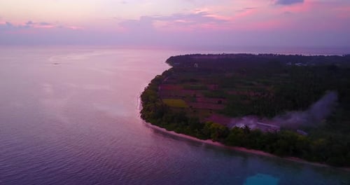 Tropical birds eye clean view of a sandy white paradise beach and blue ocean background in 4K