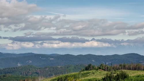 Clouds Moving over Mountains and Forest