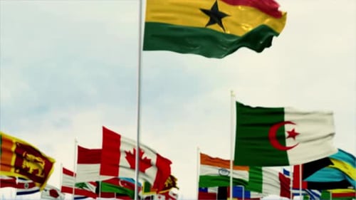 Ghana National Flag Waving with Blurred World Flags