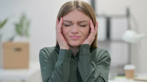 Young Woman Having Headache