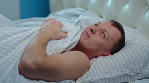 Man Dreaming While Lying in Bed Before Going To Bed, Camera Movement