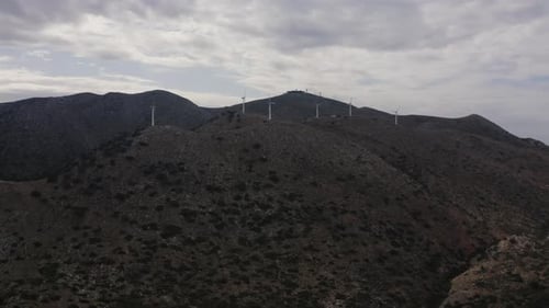 Aerial view of Wind turbine Plant in mountain. Renewable green energy