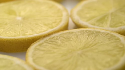 Lemon Slices Closeup, Macro Food Summer Background, Fruits Top View. Rotate