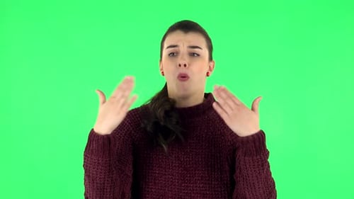 Young Tired Woman Cooling Herself By Her Hand, Suffering From High Temperature Weather. Green Screen