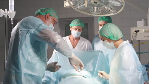 Surgical Team Performing Operation in Hospital Operating Room