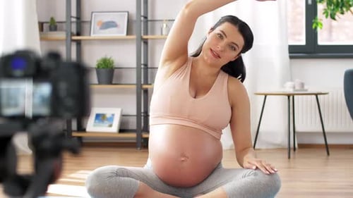 Pregnant Woman Doing Yoga at Home