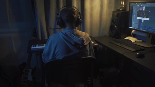 Teenager at Home Composes Music In His Home Sound Studio