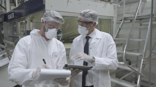 Scientists working in laboratory