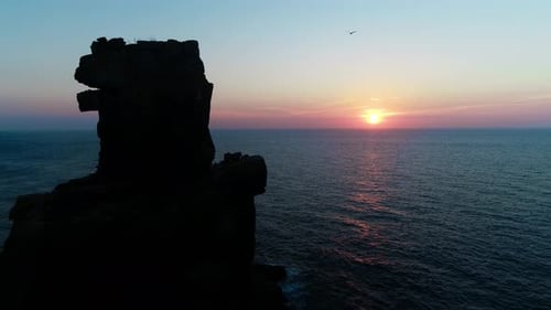Beautiful Sunset with Calm Ocean Waves