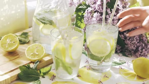 Refreshing Lemonade with Lemons and Mint Leaves