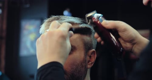 Man Gets Haircut at the Barbershop