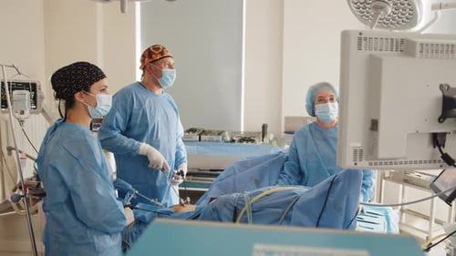 Medical Team Performing Laparoscopic Surgery in Hospital