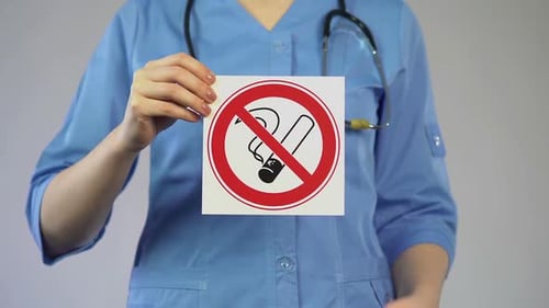 Nurse Holding in Hands No Smoking Card, Harmful Habit, Medicine and Healthcare