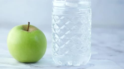 Green Apple and Water Bottle, Healthy Still Life