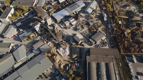 Territory of Large Cement Factory with Metal Industrial Constructions