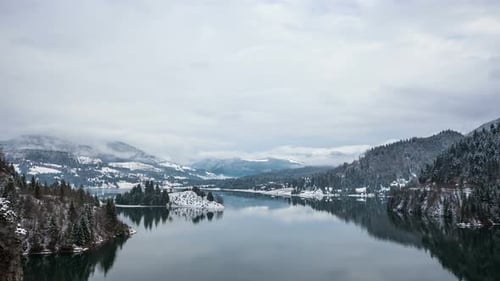 Timelapse of clouds moving over a lake