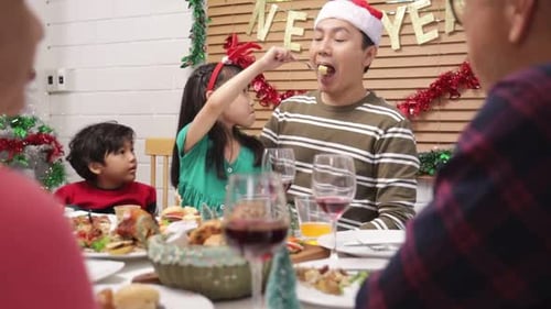 Christmas Family Dinner Celebration with Children and Adults