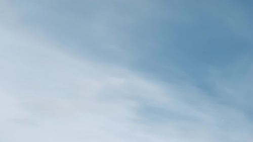 Blue Sky with Fluffy White Clouds